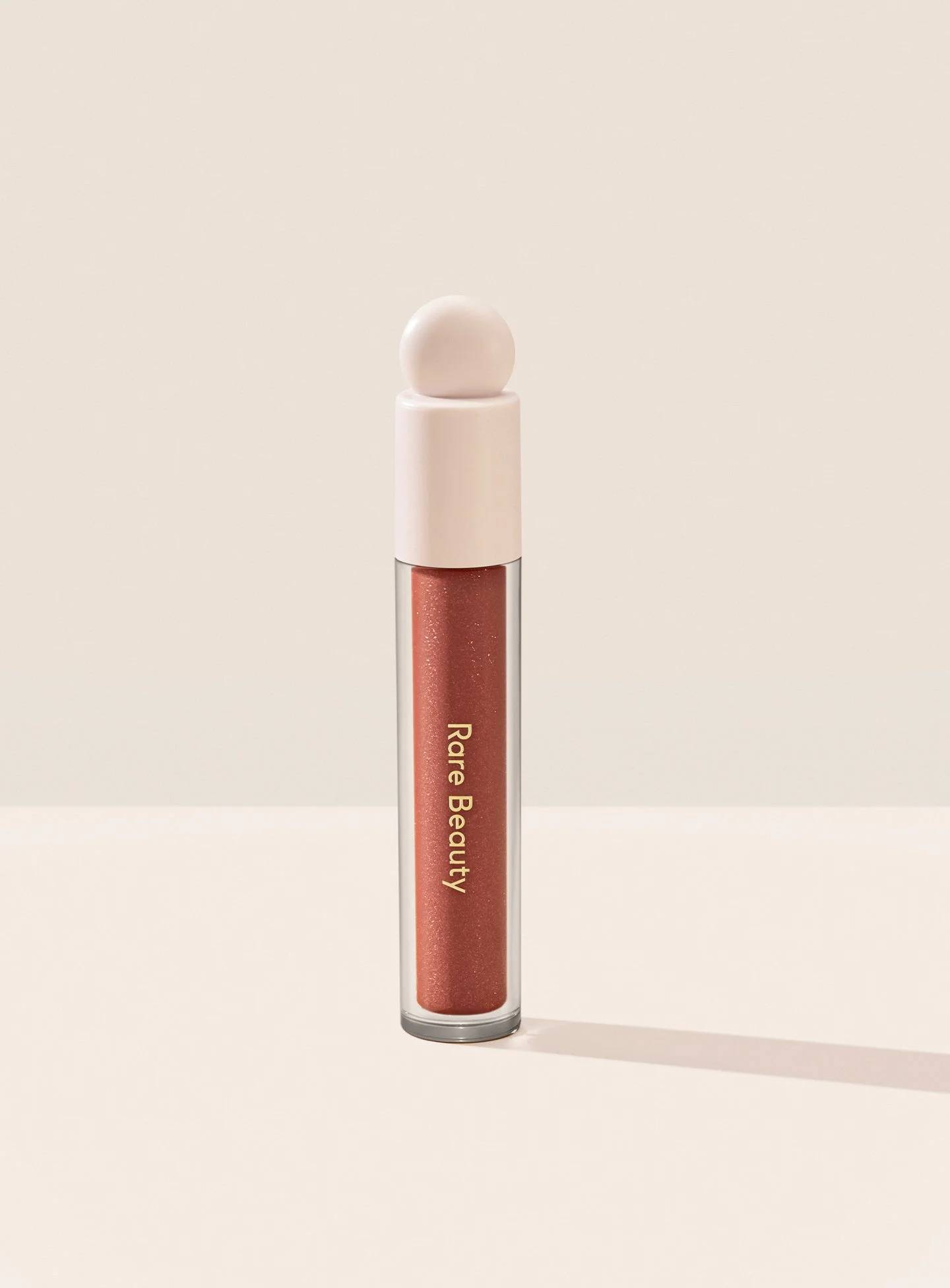 RARE BEAUTY positive Light Luminizing Lip Gloss- Spark